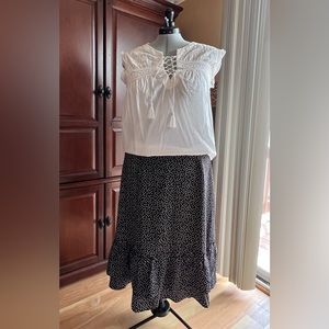 Allegra black w/ tiny hearts covering skirt w/ 4-5” ruffle flouncing hem.